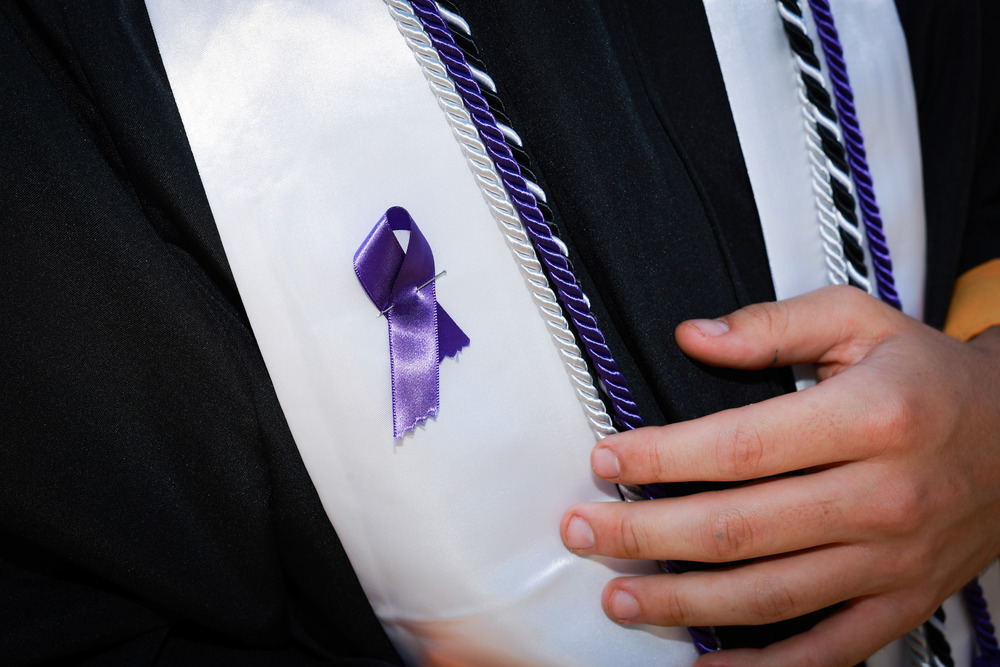 A Purple Ribbon Worn in Honor of Jewell Garland