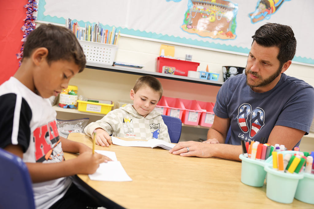 Students working at the Summer Reading Camp at Carlisle-Foster's Grove Elementary School
