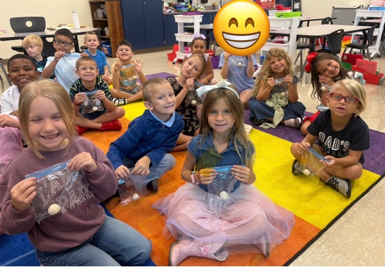Students with clay.