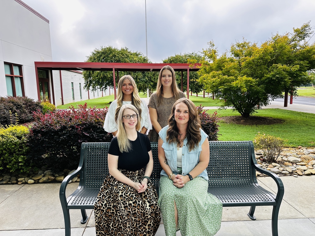K4 teachers sitting on a bench.