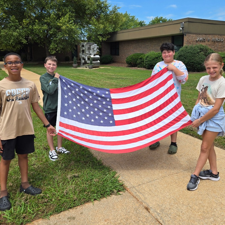 HES flag team with American flag