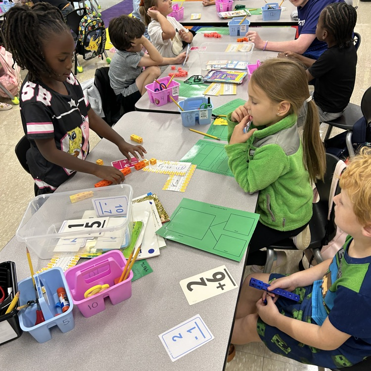 students with math manipulatives
