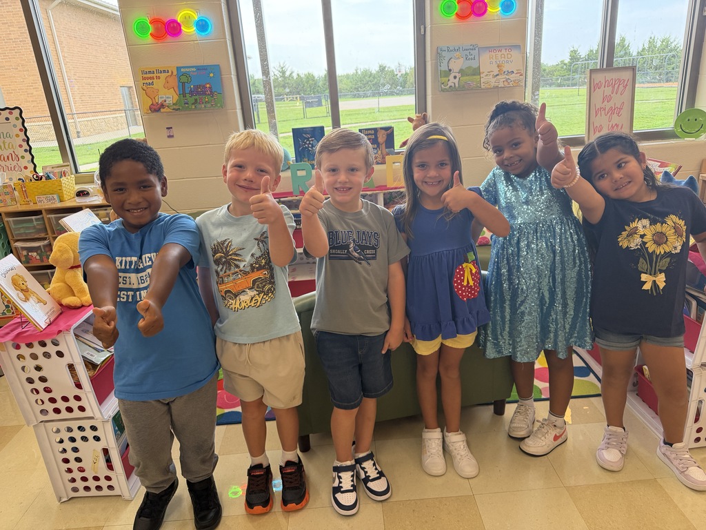 Kindergarten students give thumbs up! 