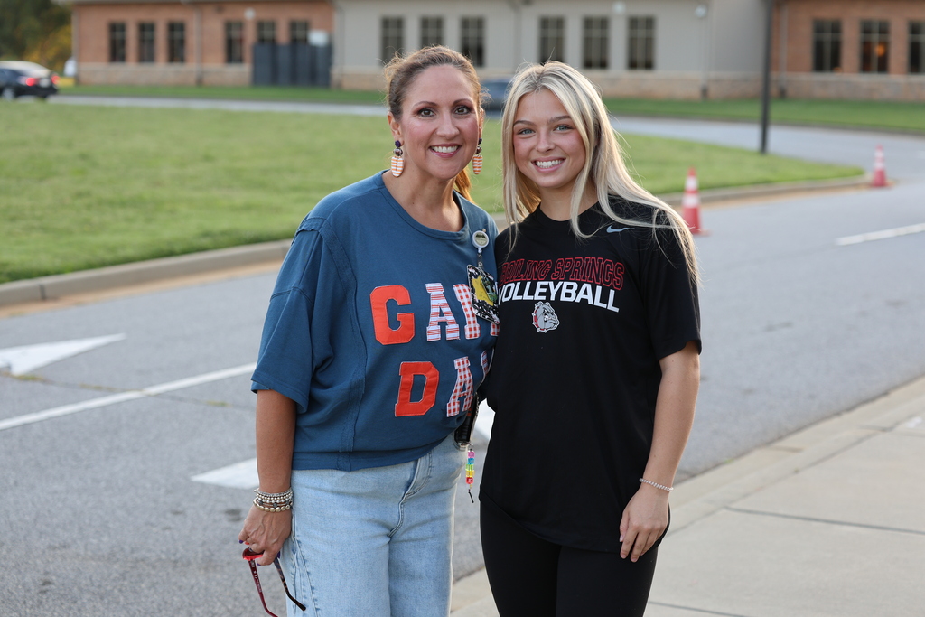 Boiling Springs Volley players help out at car duty. 