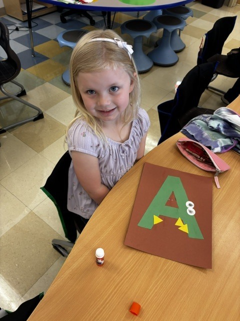 Kindergarten students make A for Alligator! 