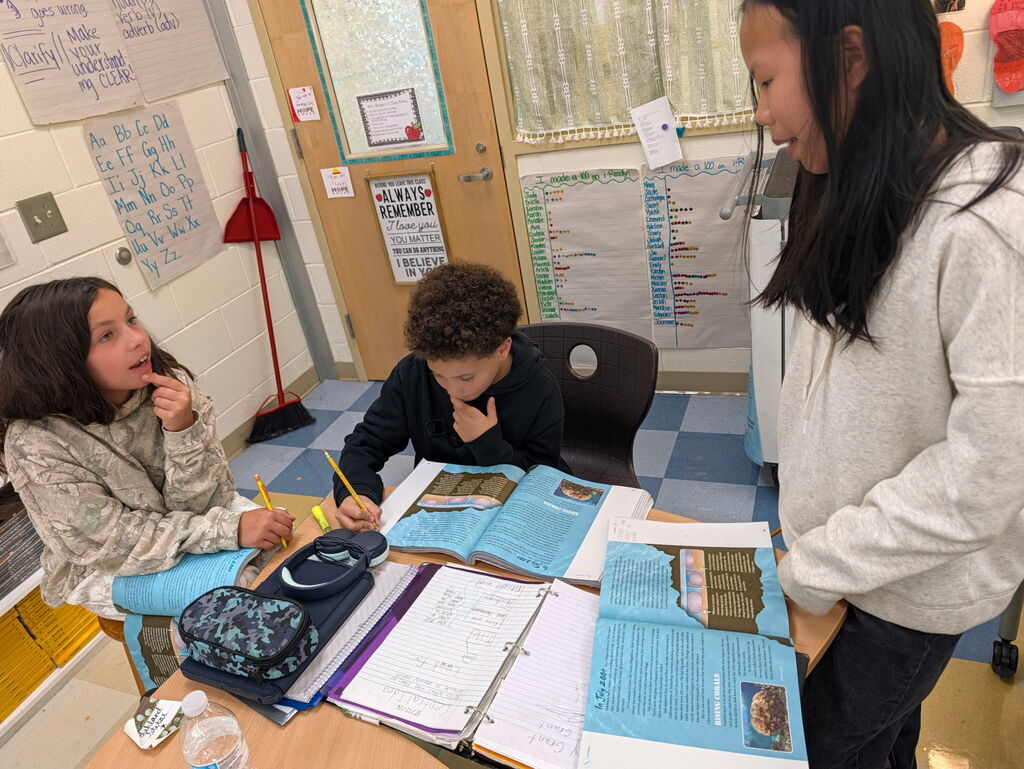Fifth grade works to find central idea of text! 