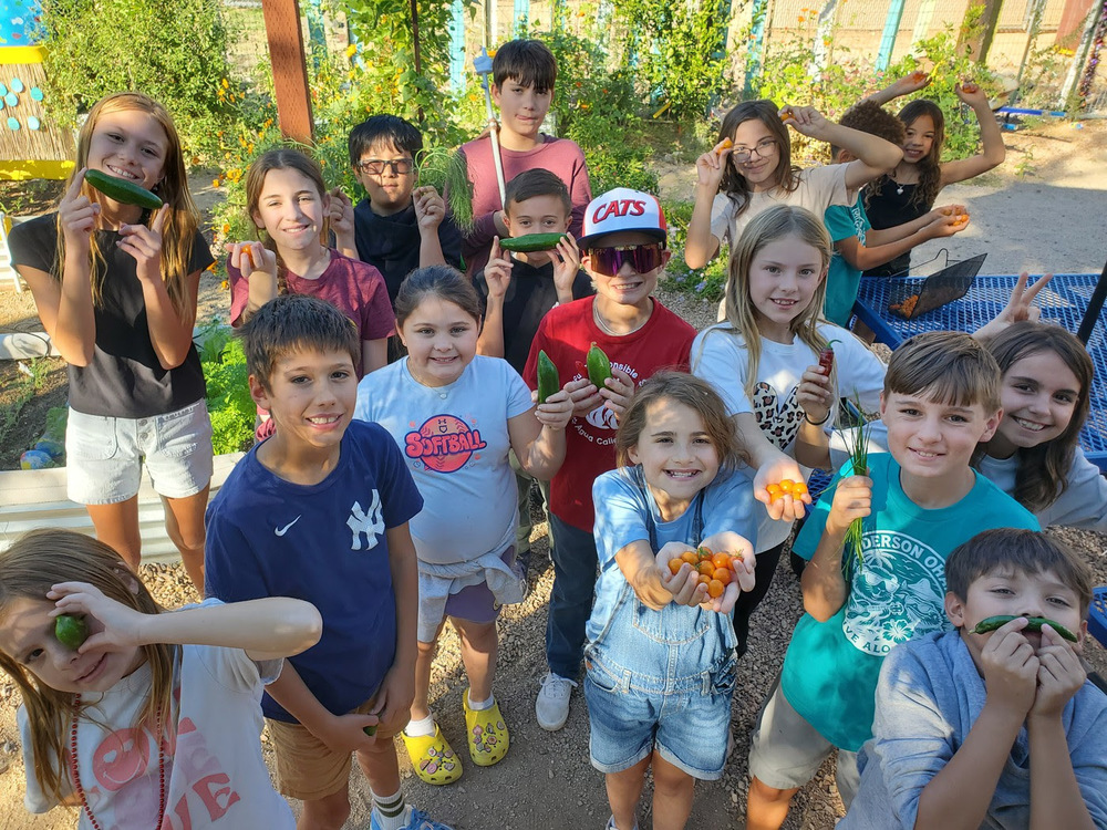 Students with veggies