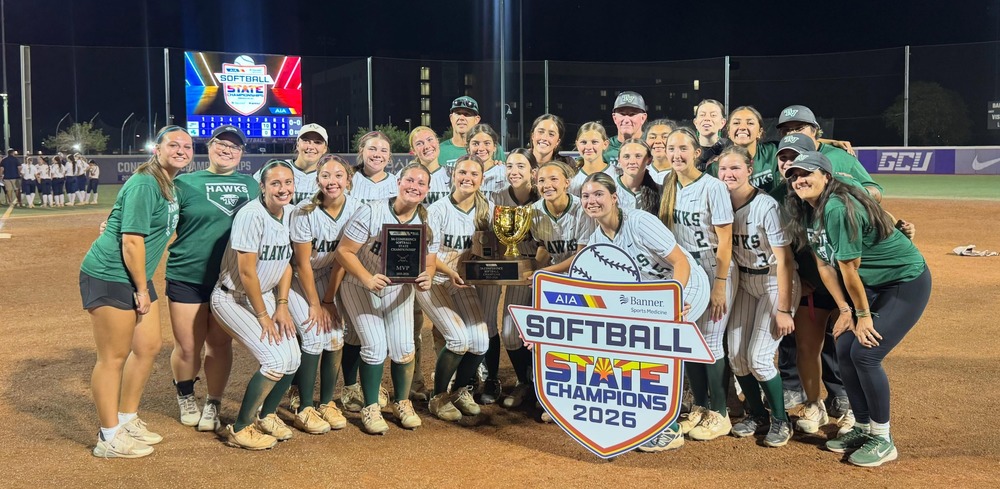 Softball team with State Championship Trophy