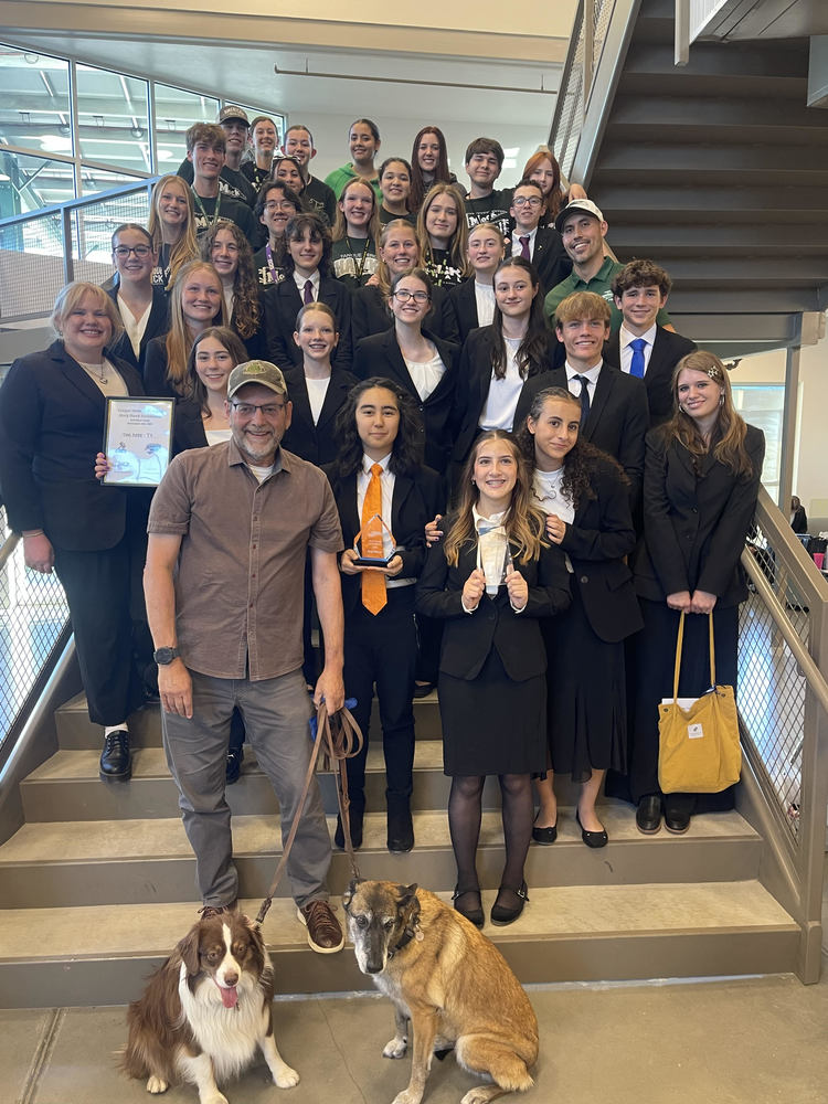 Photo of students with their coaches