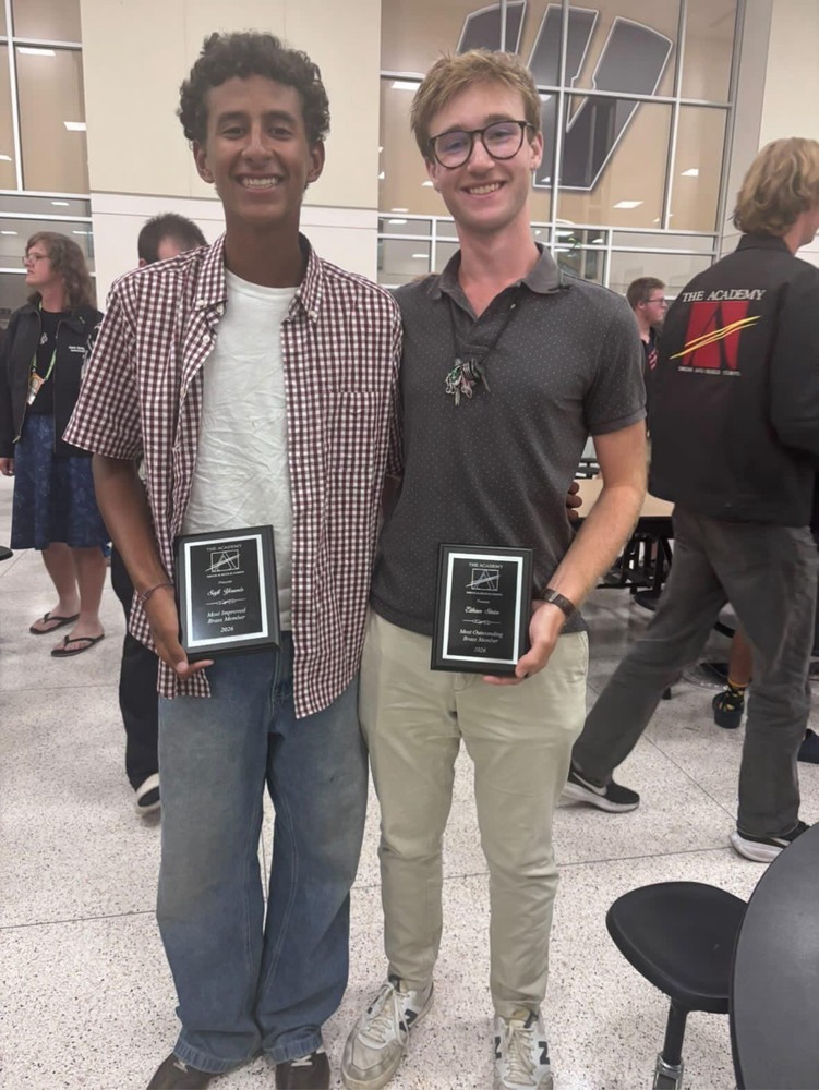 Safi and Ethan with awards