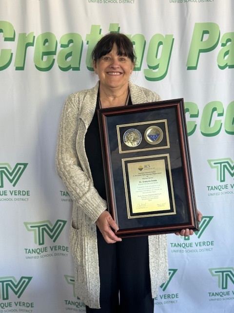 Photo of Dr. Grazyna Zreda with her award