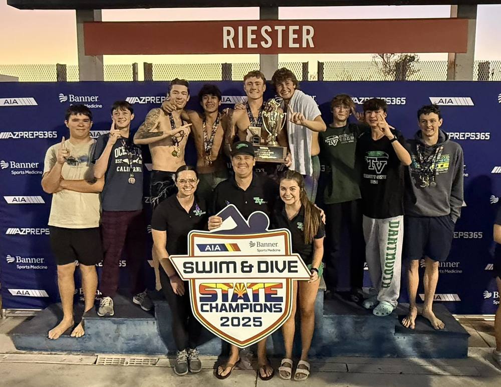 Photo of TVHS Mens swimmers with trophy