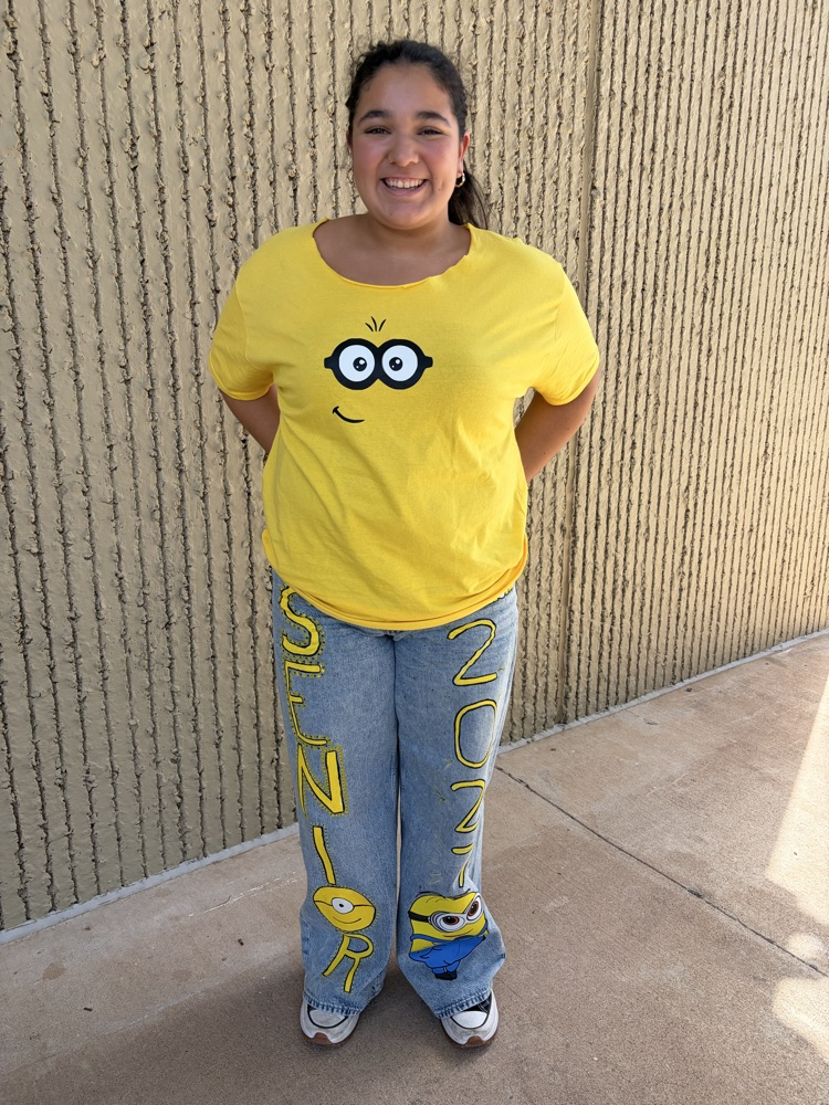 Senior Monica Perez shares her love of Minions with her father.