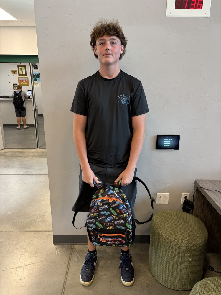 Senior Tyler Opsut grabbed the first thing he saw and of course, the traditional senior kids’ backpack.