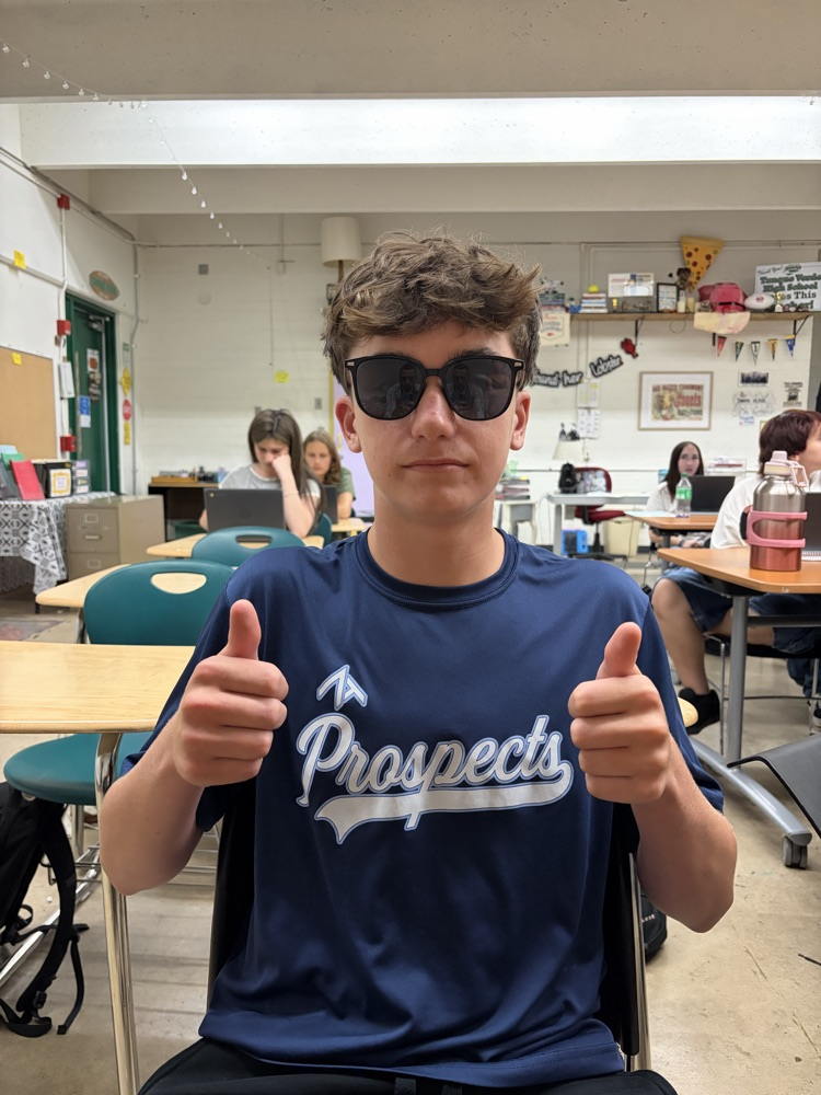 Preston Harwell borrowed George’s glasses before sharing that he likes that he gets to decide his own path around campus, that his teachers are understanding, and he feels like he has more control over his destiny.