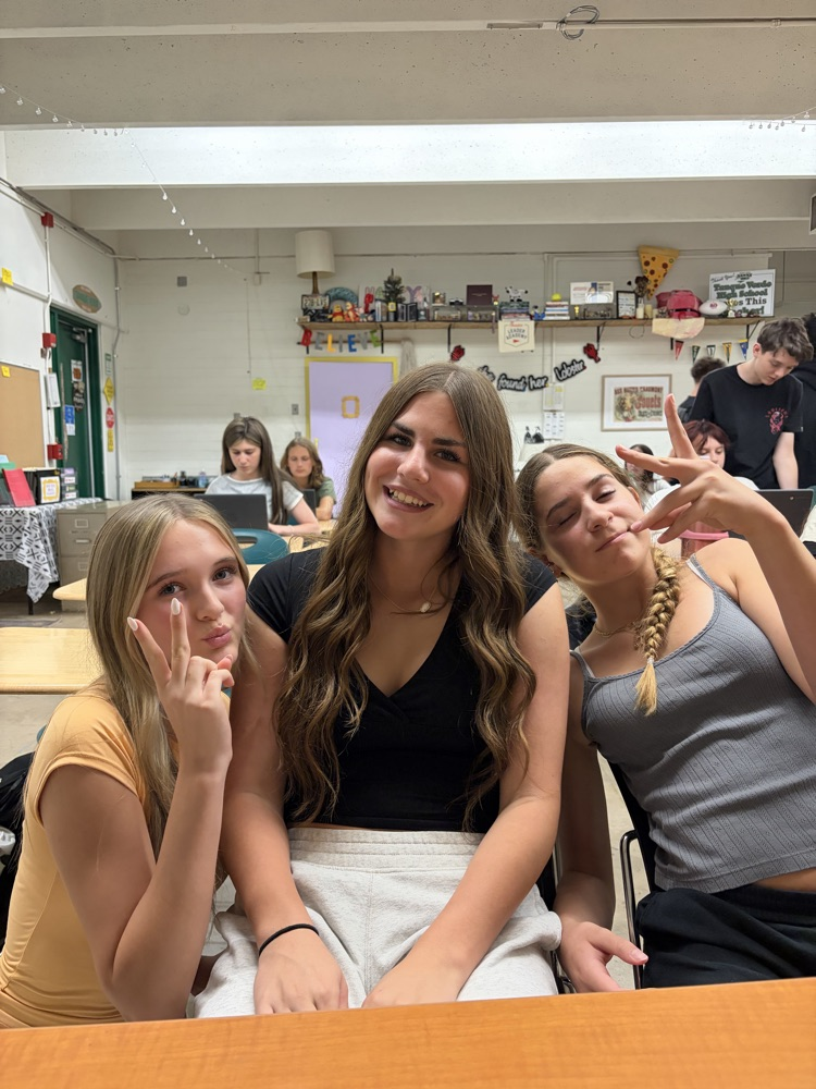 Claire Larson says upperclassmen are scary and the class material happens faster in high school, and she likes it!