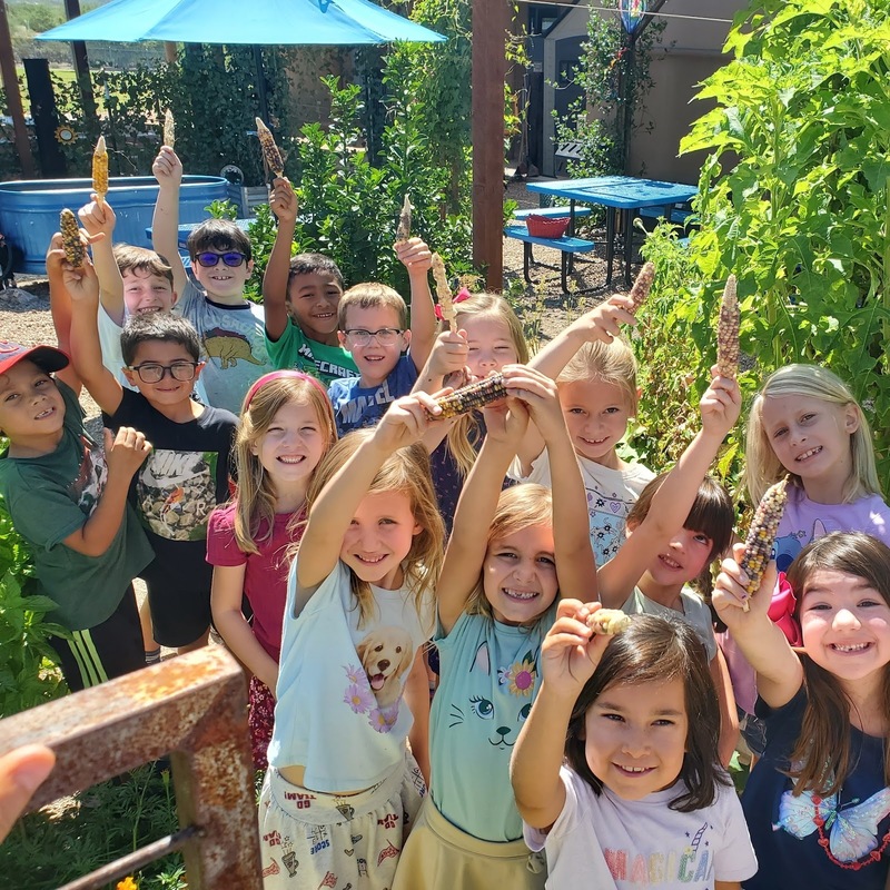 students with corn