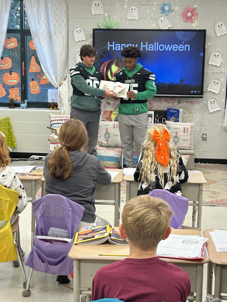 Dixie high athletes reading to CTE students