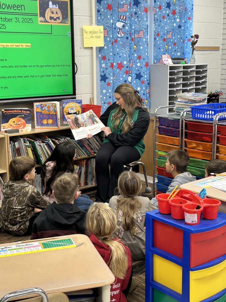 Dixie high athletes reading to CTE students