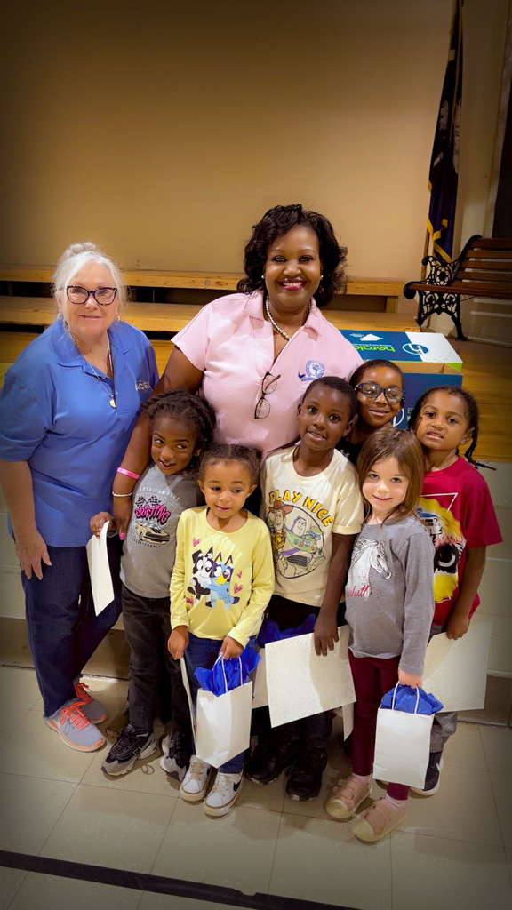 Dr. Brewton gives out goodie bags