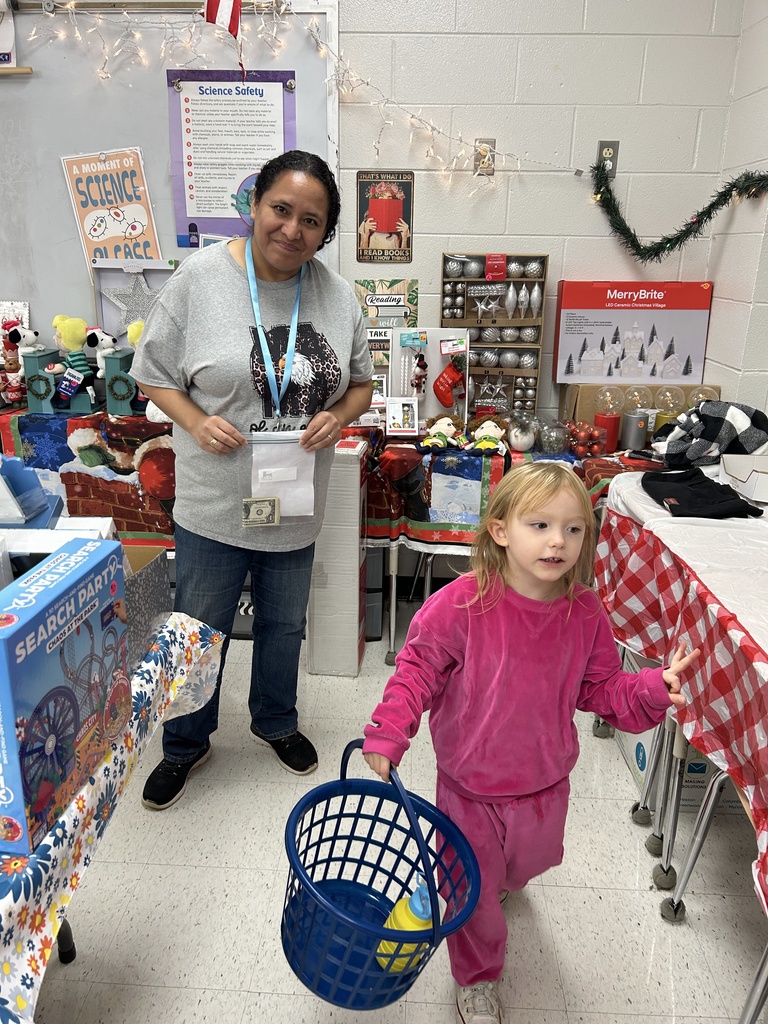 students shopping at the christmas store