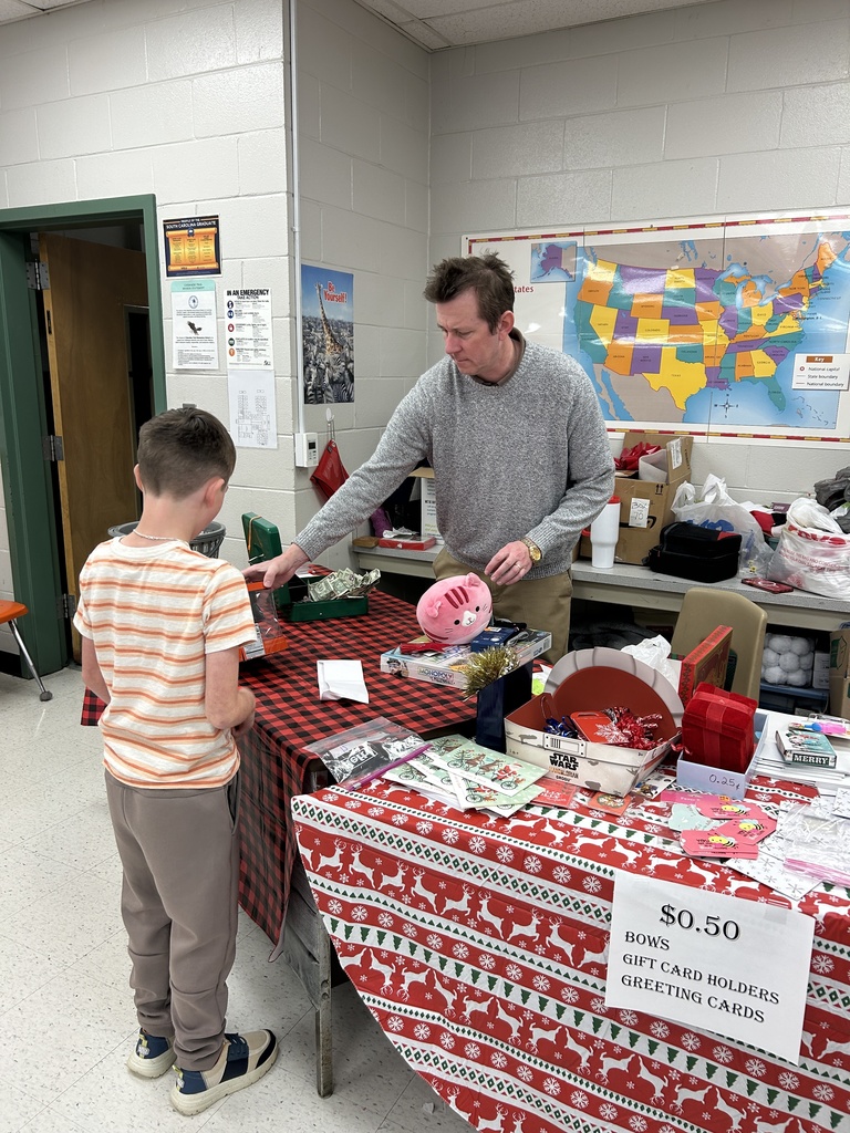 students shopping at the christmas store
