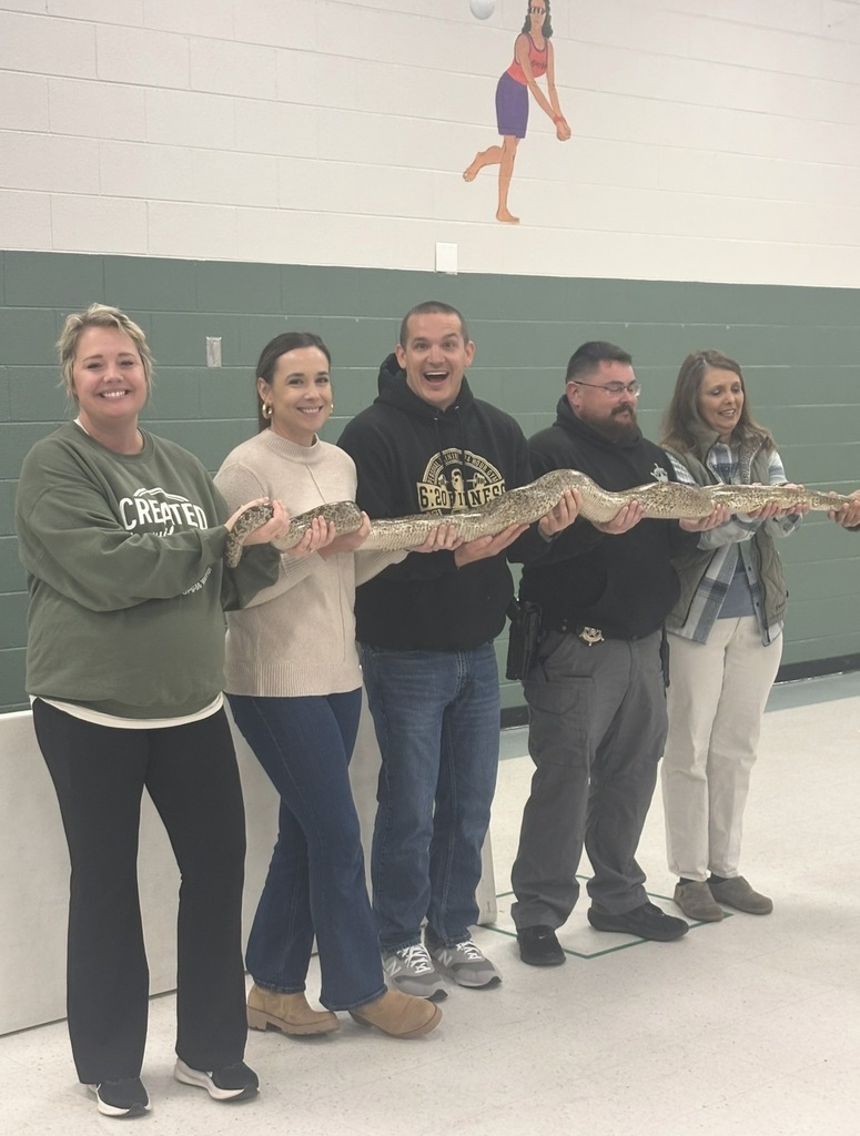 teachers holding a python