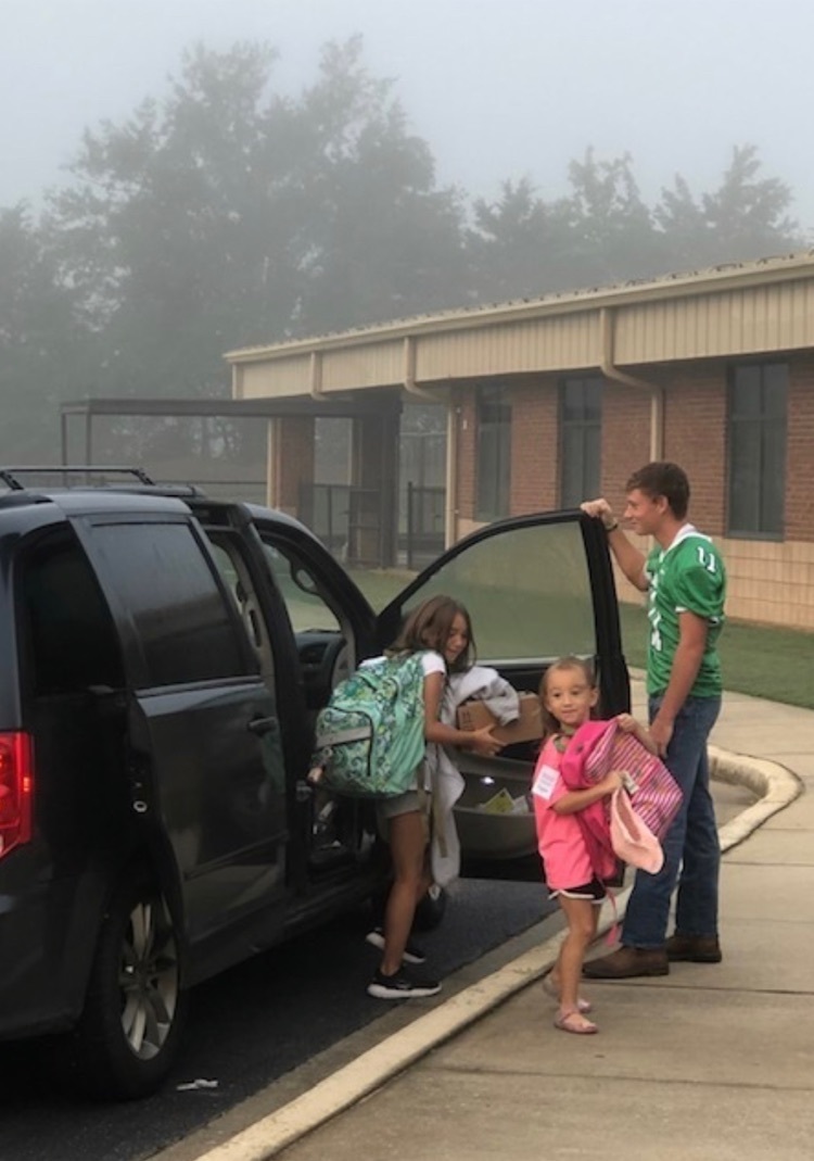 athletes assisting with drop offs