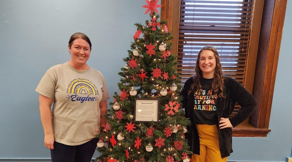 HMS, SMS teachers with Christmas Tree Lane tree