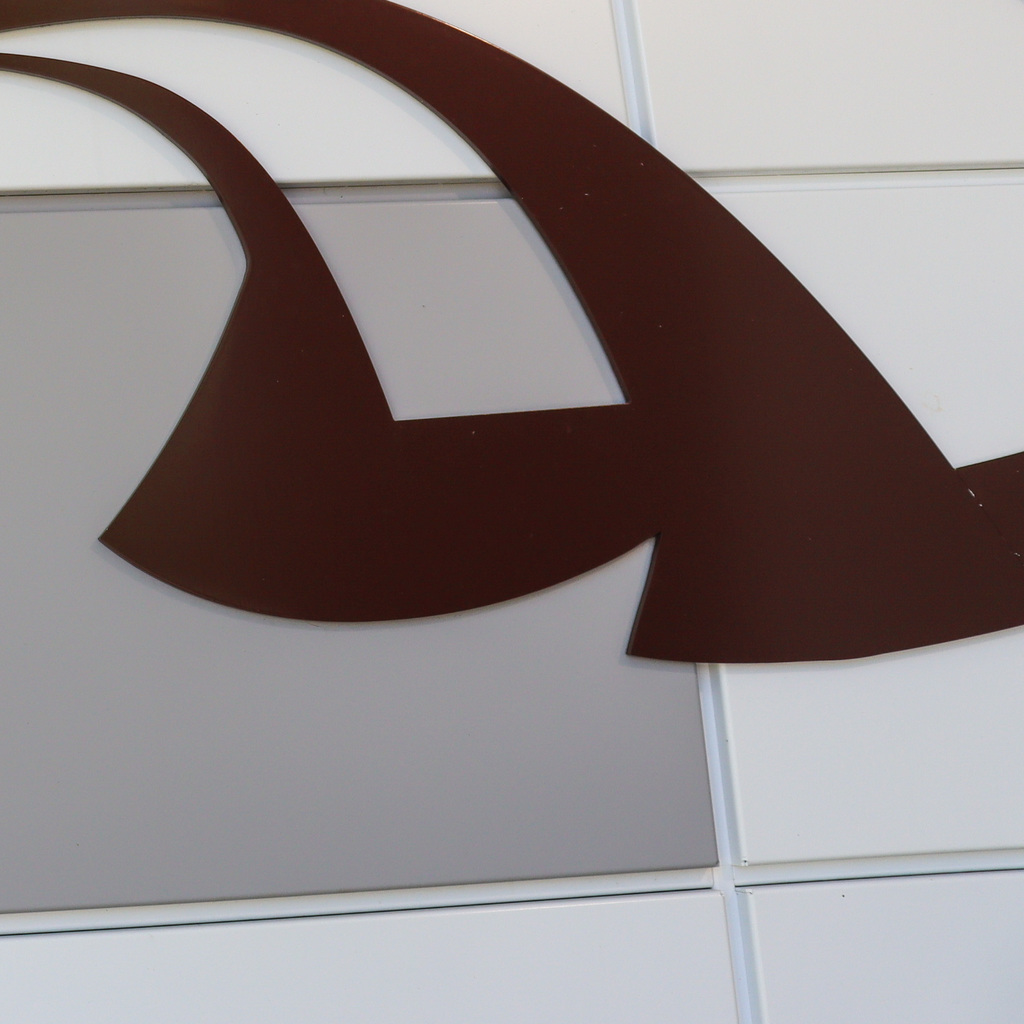 Closeup image with squares and lines of brown, tan and white