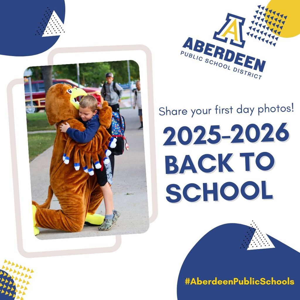 Little boy hugging the Golden Eagle mascot - share your first day photos!
