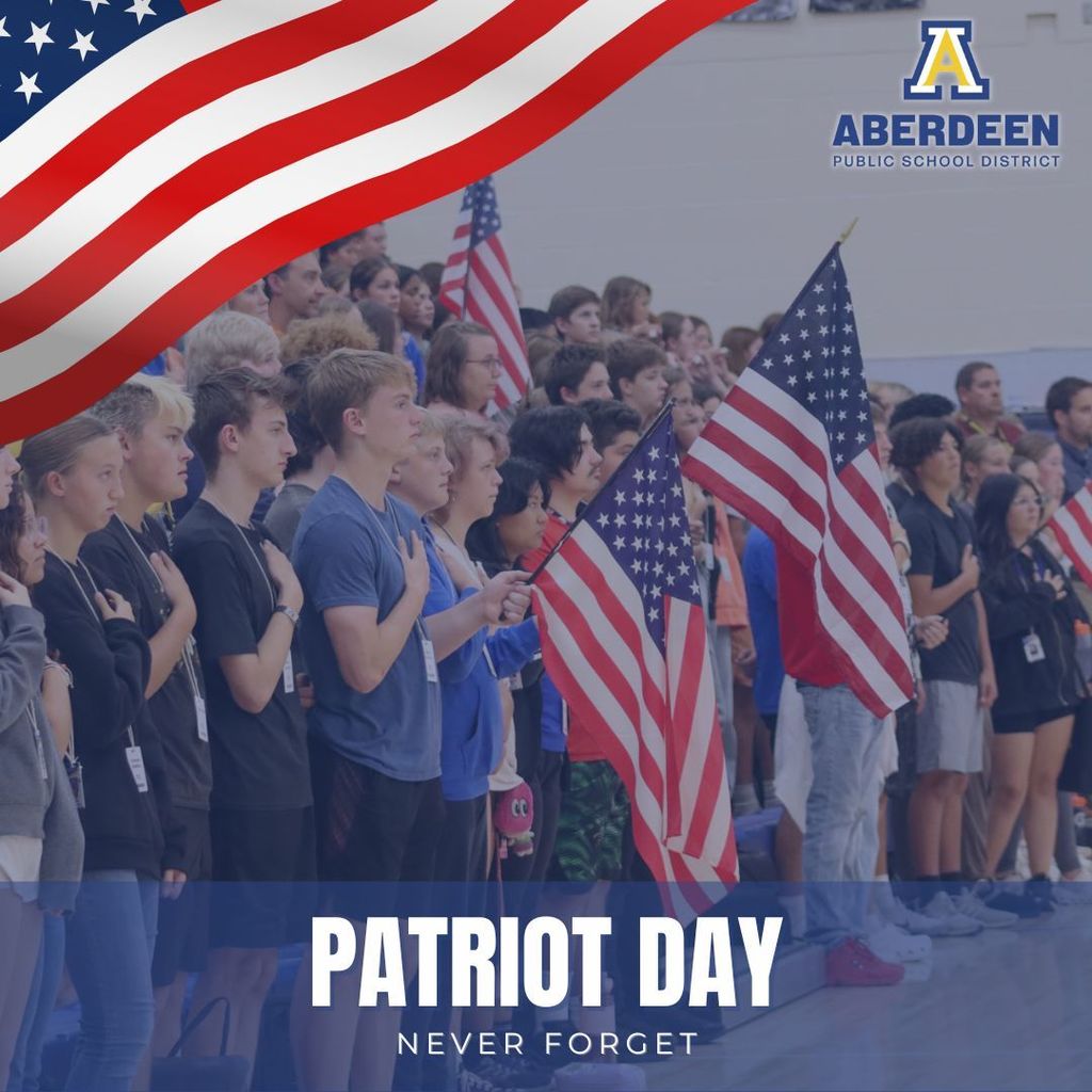 Patriot Day - Never Forget - students holding American Flags