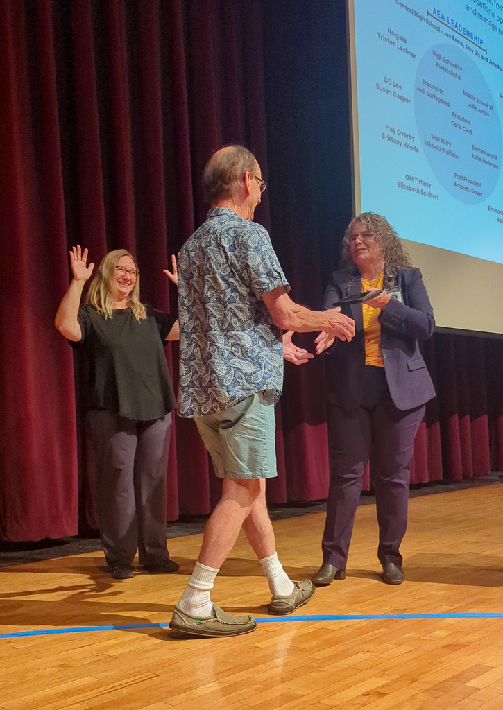 Ed Korbel receiving his award from Carla Clark