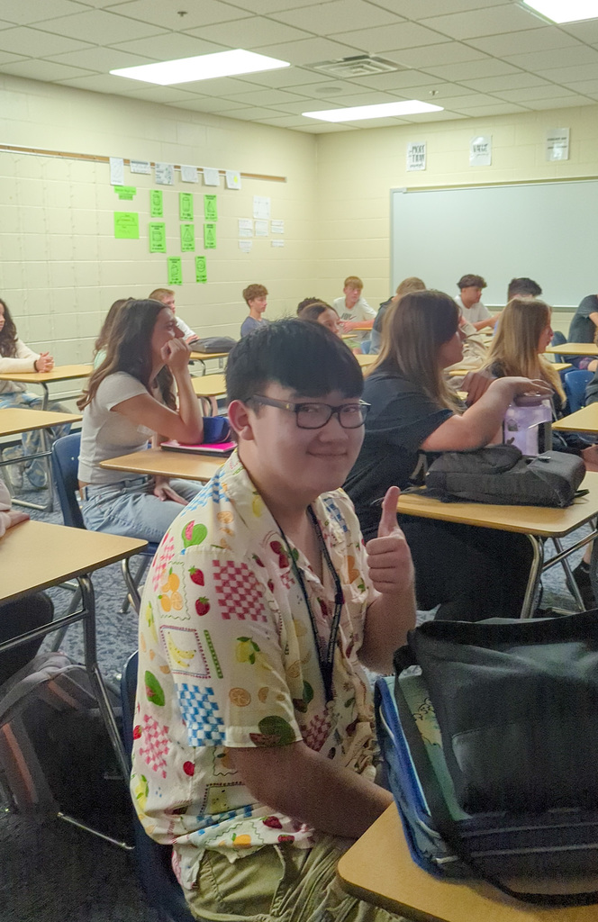 A student giving a thumbs up at freshman orientation at CHS