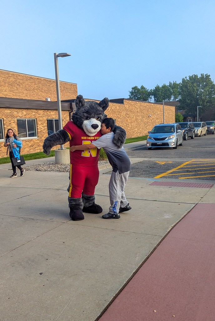 SMS student hugging Thunder