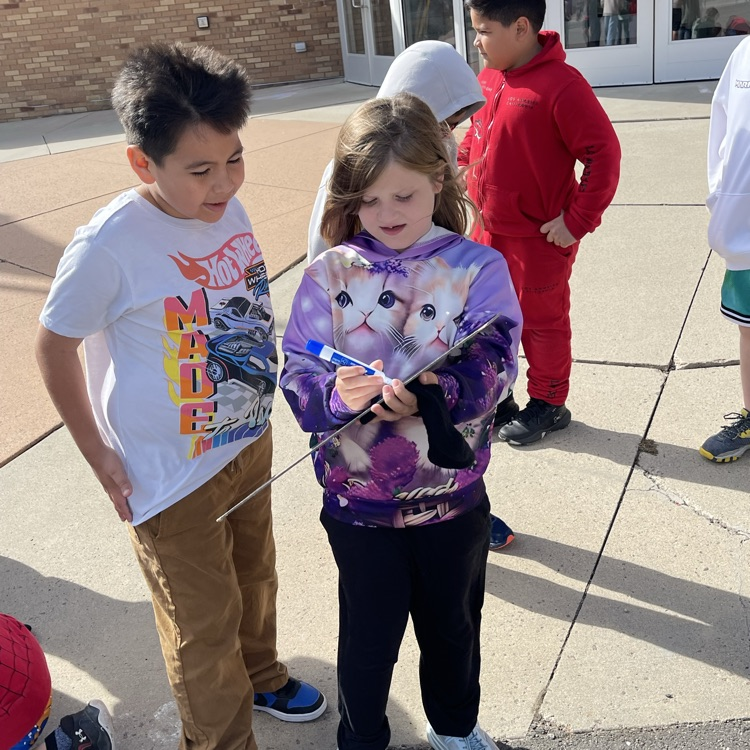third grade playing a rhythm game
