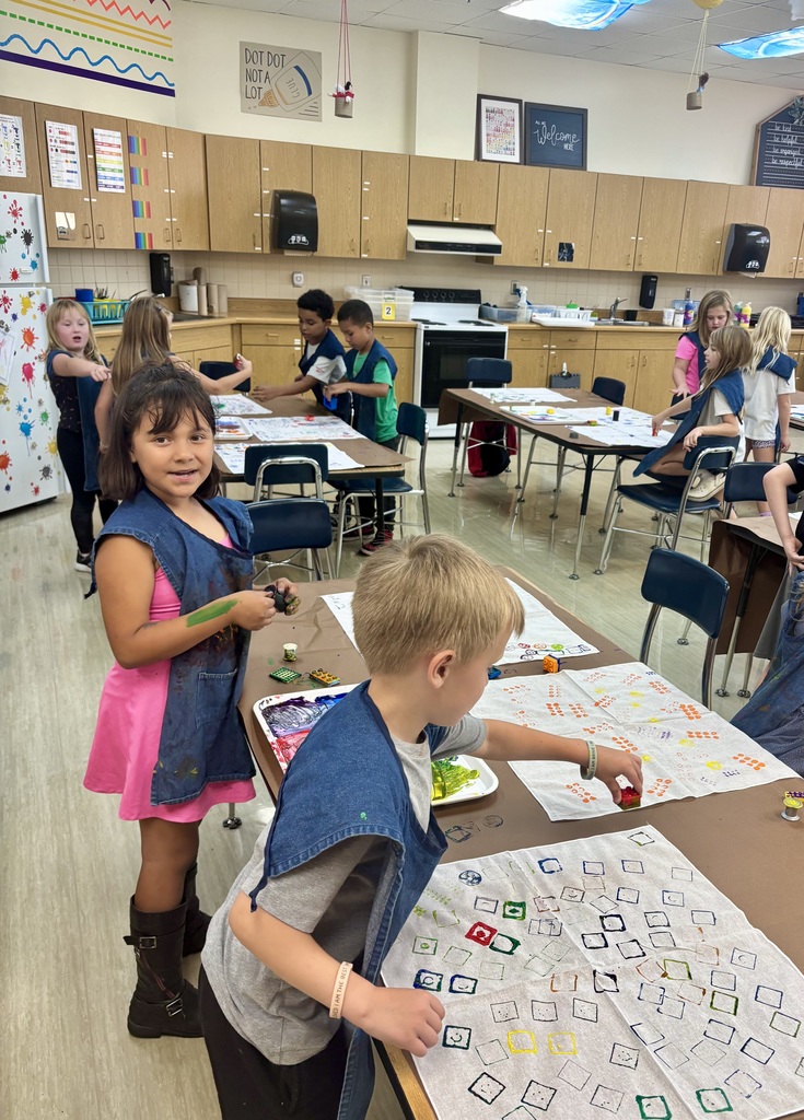 O.M. Tiffany students working on wearable art projects