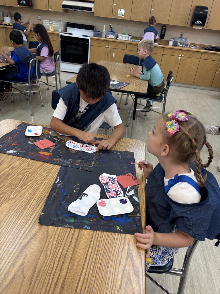 O.M. Tiffany students working on wearable art projects