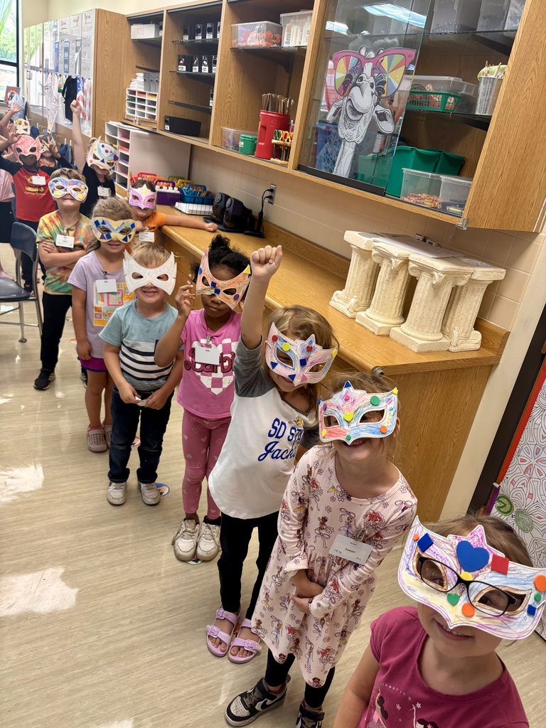 O.M. Tiffany students with their wearable art projects