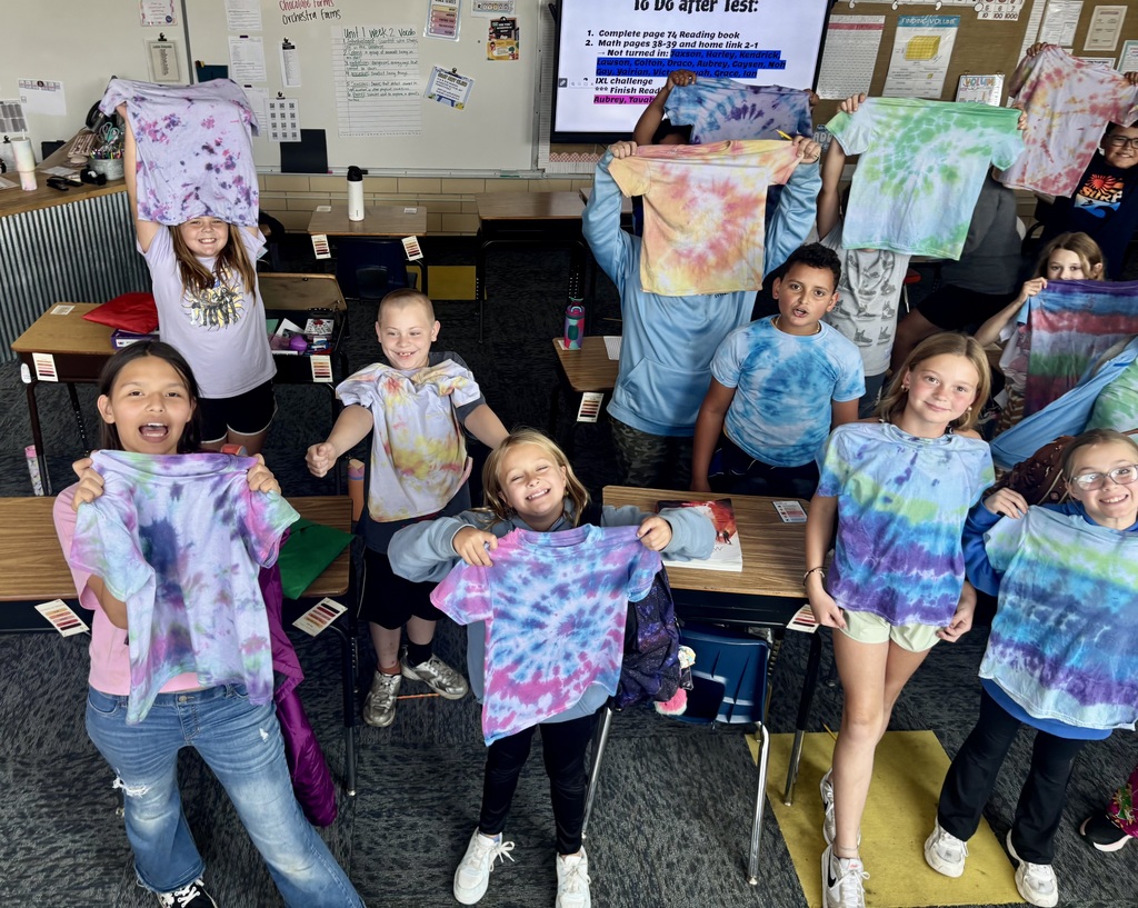 O.M. Tiffany students with their wearable art projects