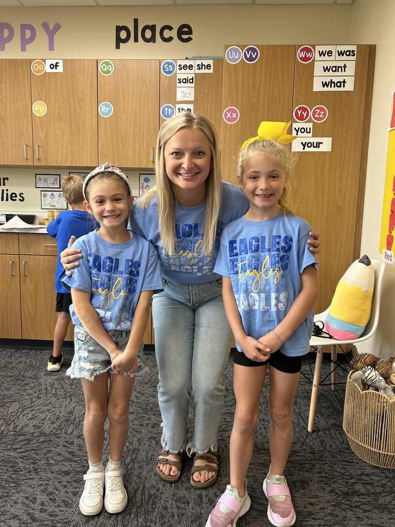 Mike Miller students and teacher wearing Golden Eagles gear