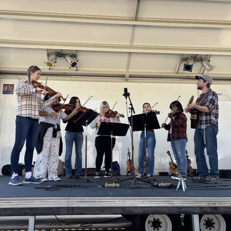 CHS Orchestra Students fiddling