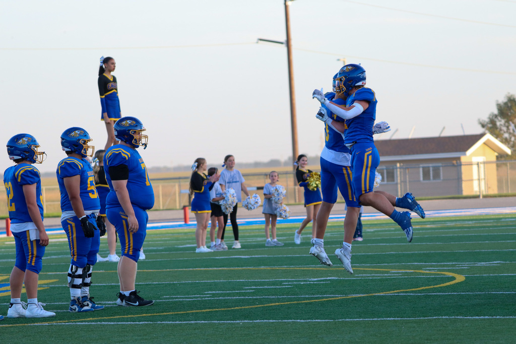 Football players at homecoming game
