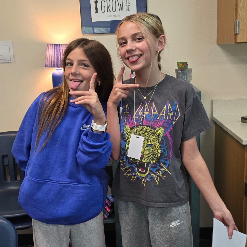 Students work together in language arts to find figurative language.