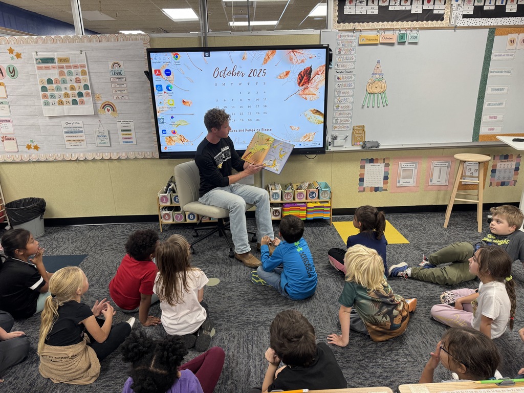 CHS student reading to Lincoln students