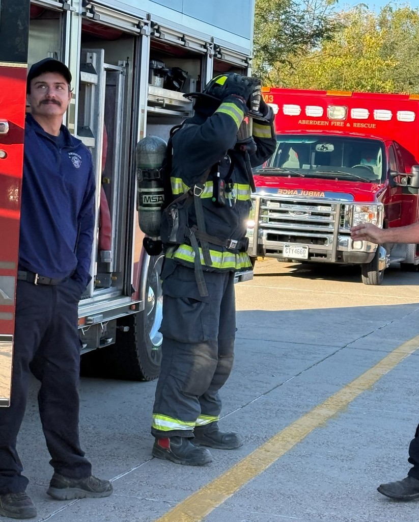 Firefighters visiting Mike Miller Elementary