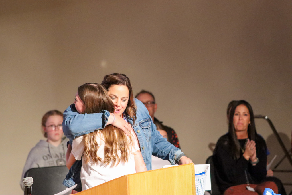 Holgate student and teacher hugging