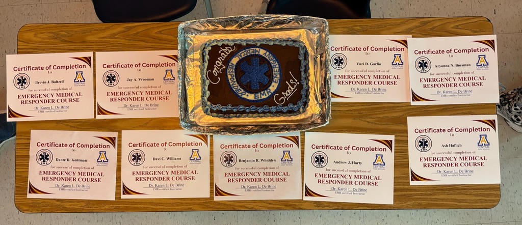 EMR graduation cake and certificates