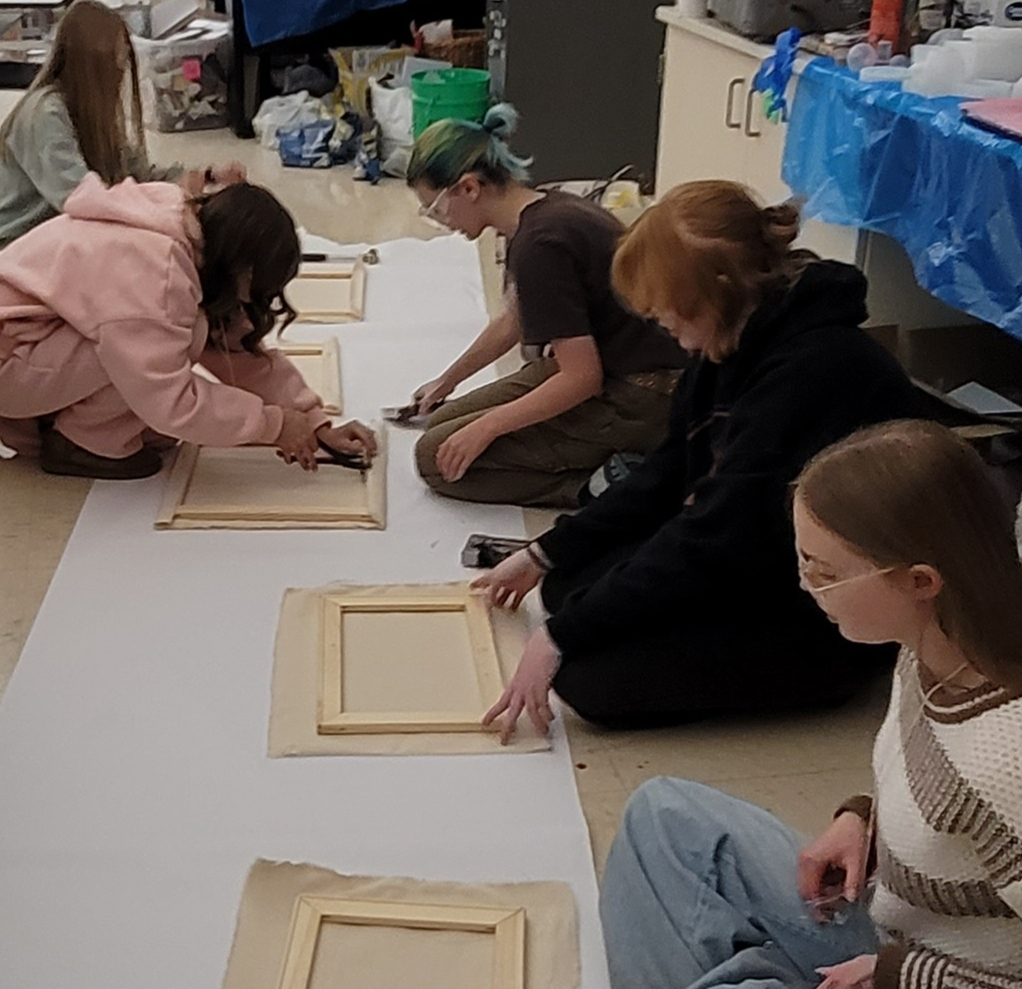 Students are building their own canvas in Mrs. Dallmann's Painting 2 class!