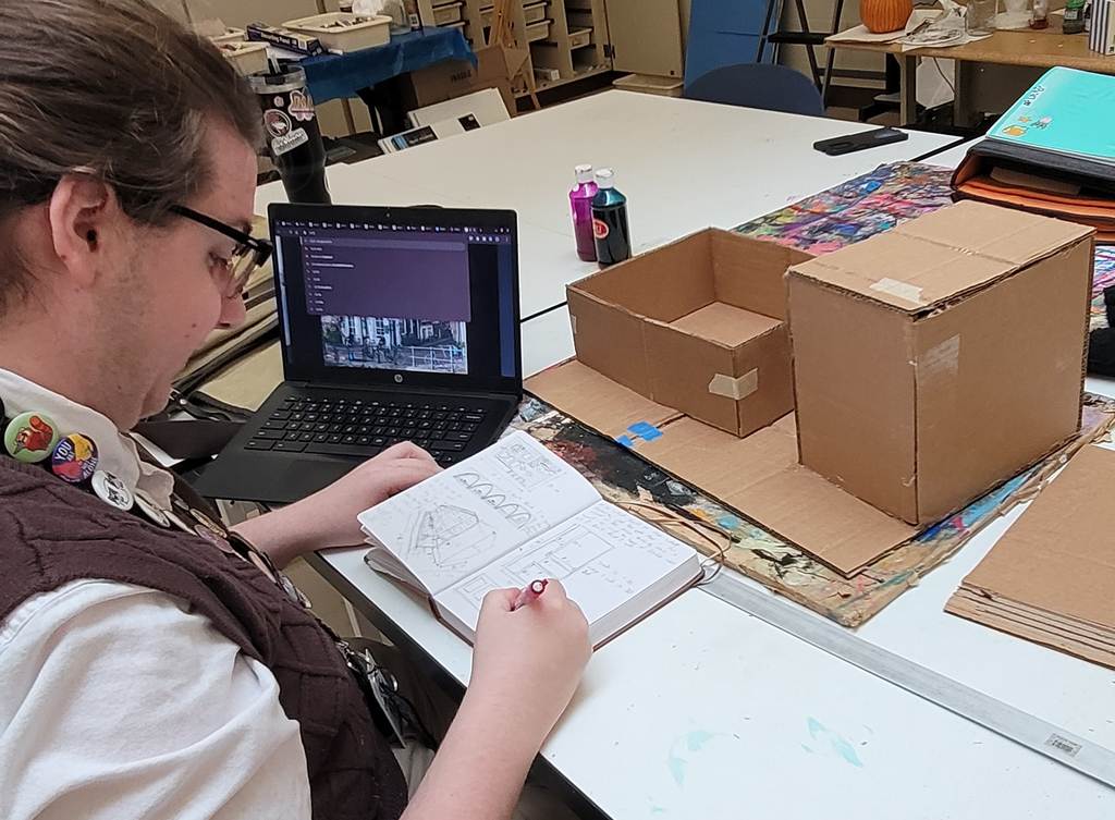 Honor's art student Daniel O'Connell is working on an up-cycled diorama from a sketch! 